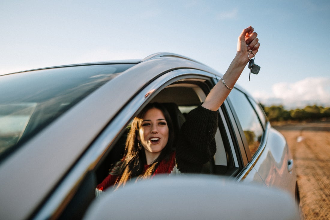 a person sitting in a car